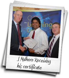 J Mulhern Receiving his certificate